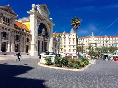 a person running in front of a large building at Ma place au sud Nice 405 in Nice
