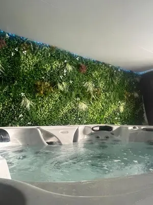 a bath tub with a garden in the background at Nissa la Bella in Nice