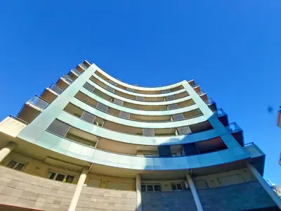 a tall building with a blue sky in the background at Nestor&Jeeves - FRESCO - Central - Very close sea - Balcony in Nice