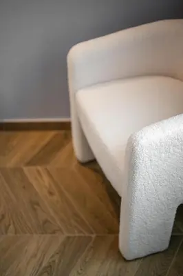 a white couch in a room with a wooden floor at La Suite Lascaris PORT of NICE #renovated in Nice
