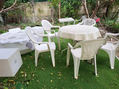 a group of chairs and tables and a table and chairs at 2 pieces pour 4 personnes proche tram in Nice