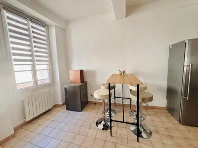 a room with a desk and a bed in it at Heart of the Old City - Nice in Nice