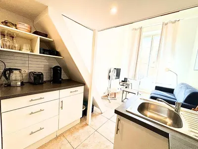 a kitchen with a sink and a counter top at Cosy appart 4pers vieux Nice in Nice
