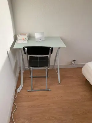 a desk with a chair and a laptop on it at Chambre Nice hyper centre ville in Nice