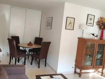 a bathroom with a shower and a washer and dryer at Charmant 3 pièces classé 3 etoiles en centre ville in Beaulieu-sur-Mer