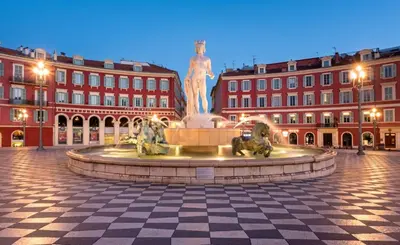 a fountain in a square in front of buildings at Studio Emmé neuf indépendant Nice Centre in Nice