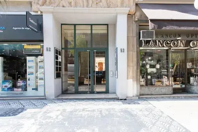 an entrance to a store with glass doors at L53 1BR Hotel des Postes, Place Massena Terrace & AC in Nice