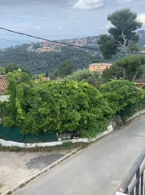 a row of bushes on the side of a road at THE GREEN OASIS breathtaking sea views, swimming pool, privacy in Villa Liliana in Tourrette-Levens