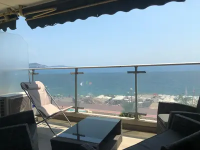 a living room with a view of the ocean at Eros in Nice