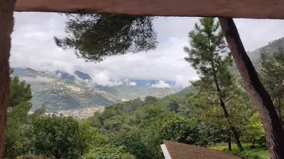 a view of a mountain from a window at Studio dans Villa Don Quijote Nice in Nice