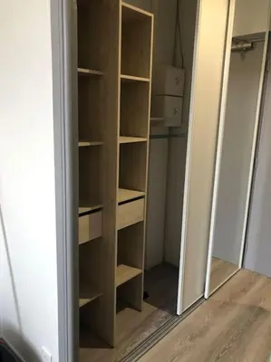 a closet with empty shelves in a room at Superbe appartement en plein centre ville de Nice! in Nice