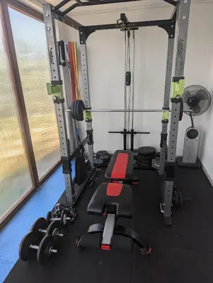 a gym with several treadmills and weights at Maison L'Aloé in Nice