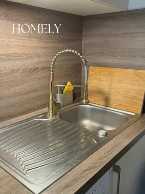 a kitchen sink with a faucet on a counter at Appt Nice-Centre avec Parking Privé proche Promenade des Anglais in Nice