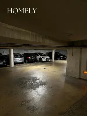 a parking garage with cars parked in it at Appt Nice-Centre avec Parking Privé proche Promenade des Anglais in Nice