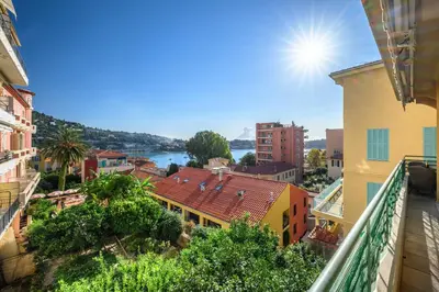 a view of a city from a balcony at 4 pièces vue mer, 6 pers, balcon, WiFi, garage in Villefranche-sur-Mer