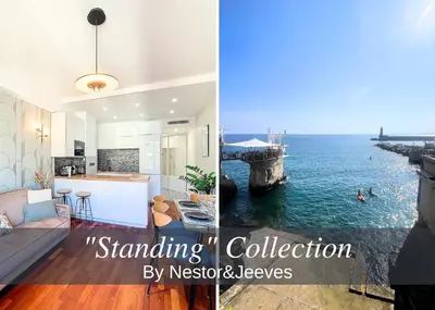 a kitchen and a living room with a view of the ocean at Nestor&Jeeves - FEI HOME - Port - Modern in Nice