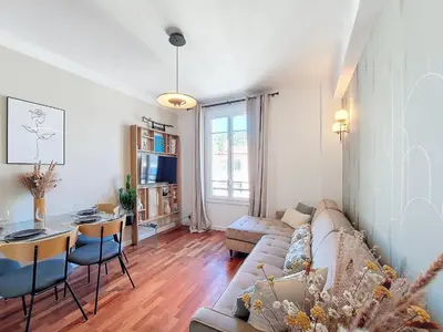 a living room with a couch and a table at Nestor&Jeeves - FEI HOME - Port - Modern in Nice