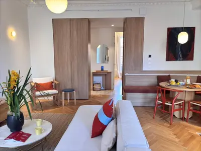 a living room with a couch and a table at Ze Perfect Place - Splendide Appart 2 Chb Garibaldi in Nice