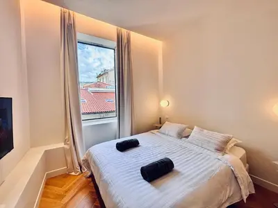 a bedroom with a bed with a large window at Ze Perfect Place - Splendide Appart 2 Chb Garibaldi in Nice