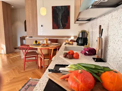 a kitchen with a table with vegetables on it at Ze Perfect Place - Splendide Appart 2 Chb Garibaldi in Nice