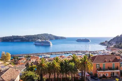 a view of a harbor with boats in the water at Esterel AP4431 By Riviera Holiday Homes in Villefranche-sur-Mer