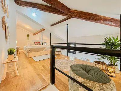 a living room with a bed and a couch at Potiers - parking, Wifi, 2pers in Nice