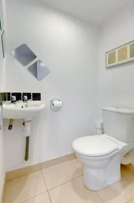 a bathroom with a toilet and a sink at Villa Kappas - B42 Promenade des Anglais in Nice