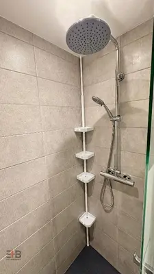 a shower in a bathroom with aanding showeroser at Le Petit Saint Barth- Easy Home Booking in Nice