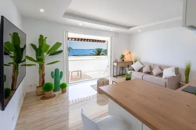 a living room with a view of the ocean at 06K1 - Front of the sea-renovated-terraceparking in Saint-Laurent-du-Var