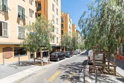 a street with cars parked on the side of the road at 1 GAUTIER 101 - Joli studio equipe - Quartier du Port in Nice