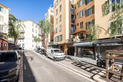 a city street with cars parked in front of buildings at 1 GAUTIER 501 - Studio boheme - Quartier du port in Nice