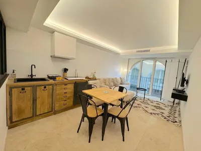 a kitchen and dining room with a table and chairs at ⁂ Magnifique 3P cœur du Vieux Nice in Nice