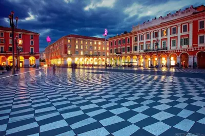 a city square with buildings and a checkered floor at Cosy duplex, hyper centre, wifi,air conditionner in Nice