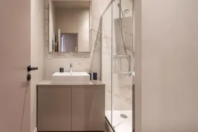 a bathroom with a sink and a shower at #61 1 BDR Rossini Centrale Balcony AC in Nice