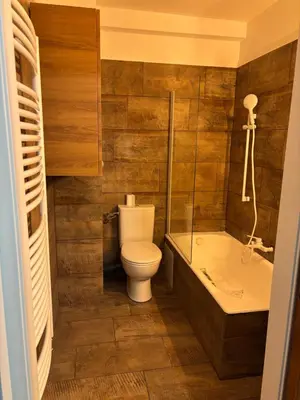 a bathroom with a toilet and a bath tub at Elégant studio de 25m2 in Saint-Laurent-du-Var