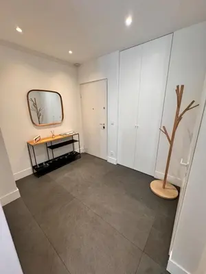 a room with a desk and a mirror on the wall at Luxury Central Condo with Private Terrace in Nice in Nice
