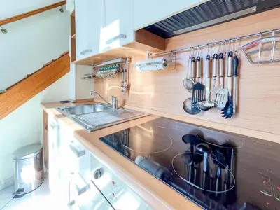 a kitchen with a sink and a counter with utensils at Barralis Hyper Center 2 Pers AC WiFi in Nice