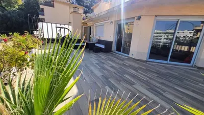 a fountain in the middle of a pool of water at Romantic 1BR Escape with Sun-Rooftop Terrace in Nice