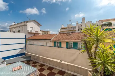 a view of a building from the balcony of a building at Studio with large terrace sea view 4th floor in Nice