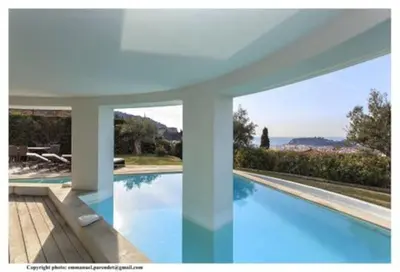 a large swimming pool in a house at MONT BORON - NICE - Splendide villa d'architecte vue panoramique in Nice