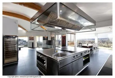 a kitchen with a sink and a stove top oven at MONT BORON - NICE - Splendide villa d'architecte vue panoramique in Nice
