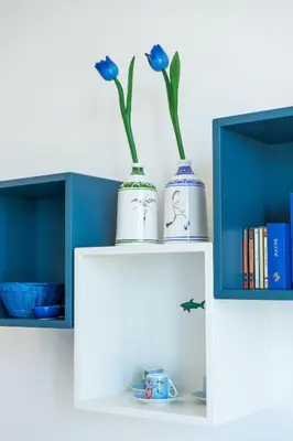 two vases sitting on top of a white cabinet at Promenade 2 Pers Vista Mare WiFi AC in Nice