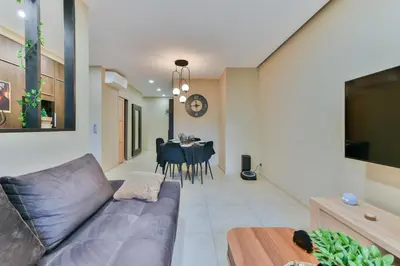a kitchen with black cabinets and a window at Charmant appartement proche du centre de Nice in Nice