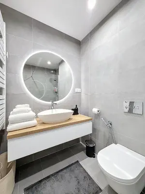 a bathroom with a sink and a mirror at Seaview Promenade des Anglais 2brs apartment Parking cars 1800 kg max in Nice