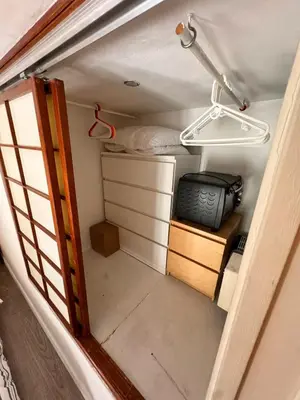 a small room with a bed and a light at Tranquil Studio with Mezzanine in Carre dOr in Nice