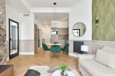 a living room with a couch and a table at #6 1BDR Buffa 2 min from the beach and Negresco,central AC Balcony in Nice