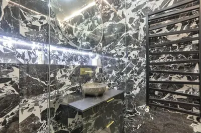 a bathroom with a sink and a marble wall at #6 1BDR Buffa 2 min from the beach and Negresco,central AC Balcony in Nice
