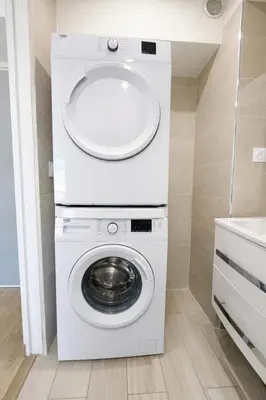 a white washer and dryer in a bathroom at Smolett 2 Pers Terrazza WiFi in Nice