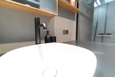 a sink with a faucet in a bathroom at Old Town Diamond, adorable sunny apartment with AC in Nice