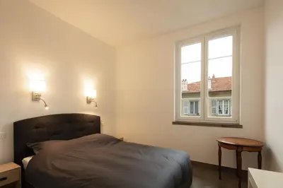 a bedroom with a bed and a window at 